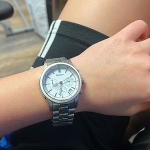 Women’s DKNY silver and white watch